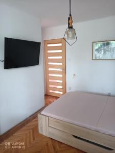 Posteľ alebo postele v izbe v ubytovaní Krisztina apartman