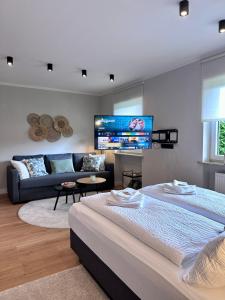 Postel nebo postele na pokoji v ubytování Business l WLAN l Boxspring I Parkplatz I Komfort