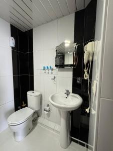 Koupelna v ubytování Hotel RichI G A