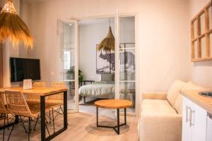 Apartamentos Ribera del Rio 36電視和／或娛樂中心