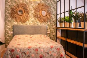 Apartamentos Ribera del Rio 36房間的床