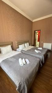Postel nebo postele na pokoji v ubytování Hotel RichI G A