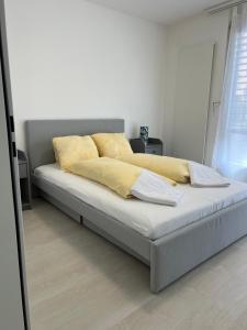 Postel nebo postele na pokoji v ubytování Apartment TOM