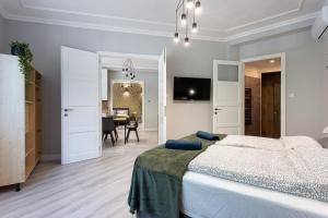 Voodi või voodid majutusasutuse Buda Castle Serpentine Apartments toas