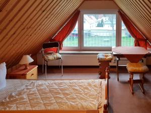 Ένα ή περισσότερα κρεβάτια σε δωμάτιο στο An der Sonnenwiese