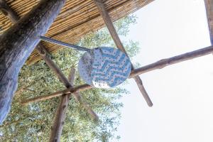 a blue object on top of a roof with trees at o' mar - Amalfi Coast Suite in Praiano
