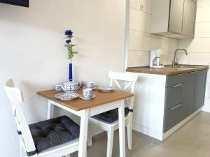 Kuchyň nebo kuchyňský kout v ubytování Studio-Apartment im Haus Frauenpreiss FeWo 404