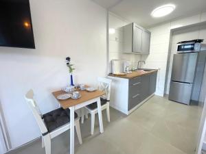 Kuchyň nebo kuchyňský kout v ubytování Studio-Apartment im Haus Frauenpreiss FeWo 404 + 9 fotografií