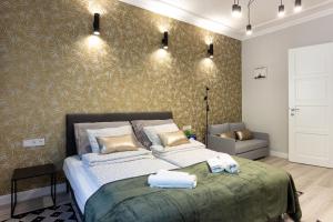 Voodi või voodid majutusasutuse Buda Castle Serpentine Apartments toas