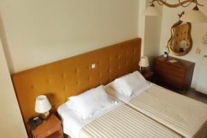 Postel nebo postele na pokoji v ubytování Sofotel