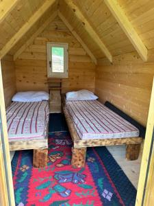 Postel nebo postele na pokoji v ubytování HarunCamp