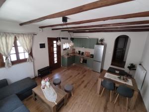 an aerial view of a living room and kitchen at Pelion bee guesthouse in Portaria