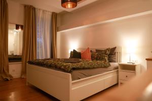 Postel nebo postele na pokoji v ubytování Boutique Hotel Pension Luisengrün Küche 1Gbs WLAN Netflix Disney MagentaTV