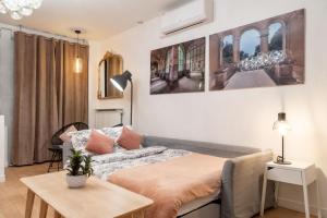 Postel nebo postele na pokoji v ubytování Appartement spacieux et rénové