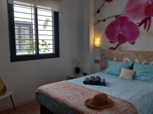 En eller flere senge i et værelse på SUITE JINETES + 55 billeder