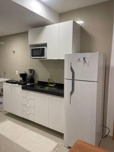 Η κουζίνα ή μικρή κουζίνα στο Flat Premium UFPE-UFRPE - Hospital das Clinicas - Andar alto - CAXANGA +13 φωτογραφίες