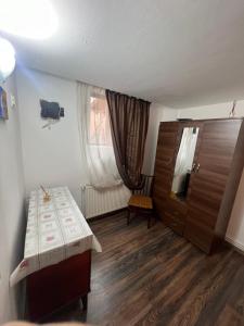 Postel nebo postele na pokoji v ubytování Costin
