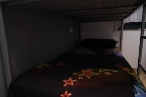 Letto o letti in una camera di Sonche Hostel