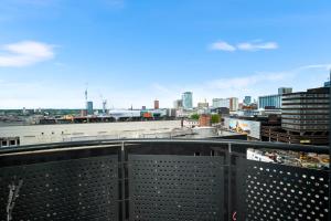 a view of a city skyline from a balcony at 2 Bedroom Apartment With Balcony - FREE PARKING in Birmingham