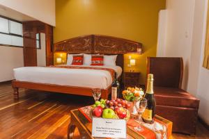 Säng eller sängar i ett rum på Quechua Hotel Cusco