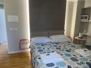 Letto o letti in una camera di B&B Suite Cutelli