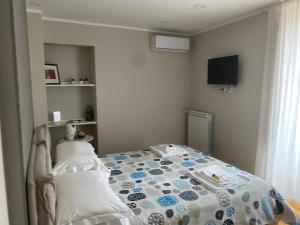 Letto o letti in una camera di B&B Suite Cutelli
