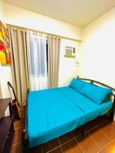 Ένα ή περισσότερα κρεβάτια σε δωμάτιο στο Philippines Manila Tricity near by Makati, Taguig, Mandaluyong, and BGC
