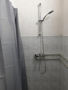 Et badeværelse på Eni Rooms