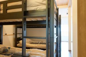 Postel nebo postele na pokoji v ubytování 尾道stay源 -MINAMOTO-