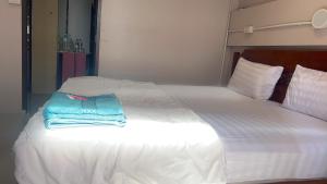Postel nebo postele na pokoji v ubytování SMILE HOME GUESTHOUSE