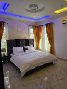 Katil atau katil-katil dalam bilik di Sapphire Residences by Crystal Magodo