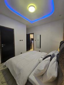 Katil atau katil-katil dalam bilik di Sapphire Residences by Crystal Magodo