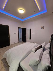 Katil atau katil-katil dalam bilik di Sapphire Residences by Crystal Magodo