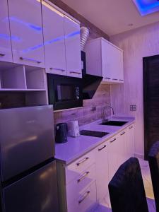 Dapur atau dapur kecil di Sapphire Residences by Crystal Magodo