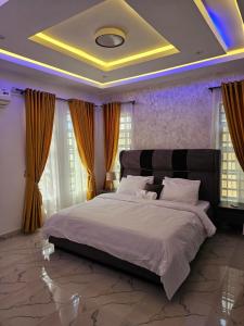 Katil atau katil-katil dalam bilik di Sapphire Residences by Crystal Magodo