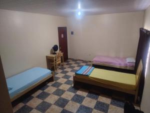Postel nebo postele na pokoji v ubytování Hotel Potiguar