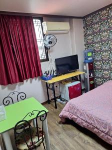 TV a/nebo společenská místnost v ubytování GwiBinJang Motel