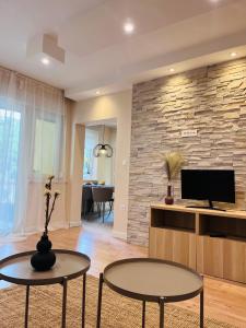 Et tv og/eller underholdning på Pula KING'S SQUARE apartment - free parking + 35 billeder