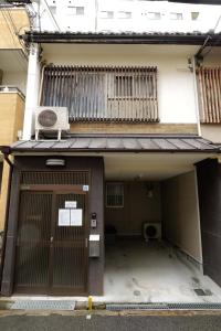 an outside view of a building with a door at Osaka - House - Vacation STAY 16353 in Osaka