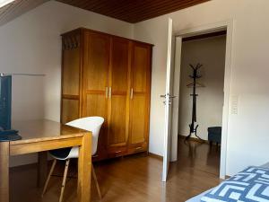 TV a/nebo společenská místnost v ubytování Business-Apartment Braun
