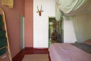 Postel nebo postele na pokoji v ubytování Casa Tikiri - BOUTIQUE HOTEL Adults-Only