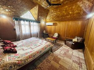 Krevet ili kreveti u jedinici u objektu Maharajas palace houseboat