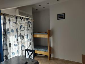 Posteľ alebo postele v izbe v ubytovaní Blue apartment