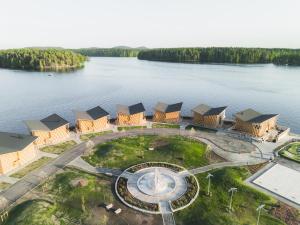 an aerial view of a building on the water at Bella Lake Resort in Kuopio