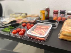 a table topped with different types of vegetables and food at Weißes Haus in Plauen