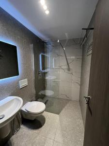 Koupelna v ubytování Hotel Ikona