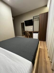 Hotel Ikona客房内的一张或多张床位