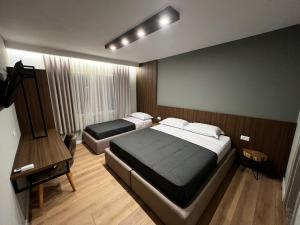 Hotel Ikona客房内的一张或多张床位