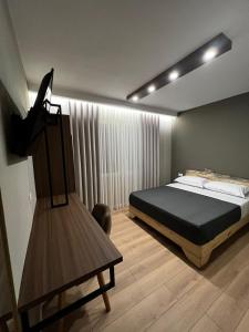 Hotel Ikona客房内的一张或多张床位