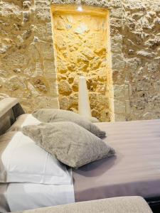 Postel nebo postele na pokoji v ubytování Casa Zia Pina